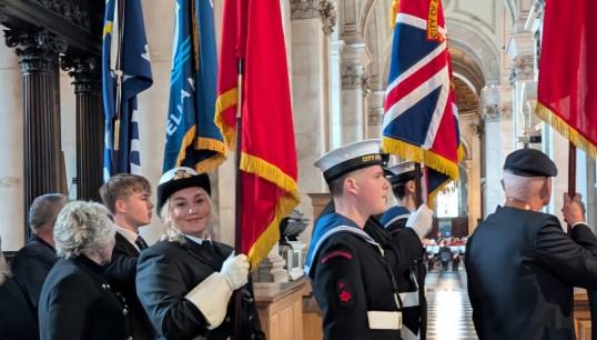 Image:Bevis Minter awardee Amilia Busby carries the Merchant Navy Standard during the ANSS service 2025 at St Paul's Cathedral in London. Images: Amilia Busby