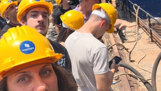 Image:Dr Kelly Gerakoudi, a Greek assistant professor in shipping management, who is conducting the DVT research, on a ship visit with her students. Image: Dr Kelly Gerakoudi