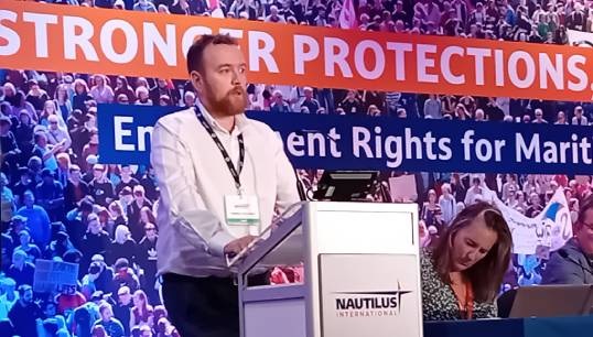 Image:Nautilus/ITF inspector Matt Parsonage presenting the motion for cracking down on lashings of cargoes in UK ports. Image: Nautilus International